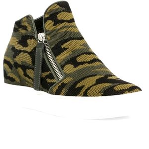 Steve Madden Camden Knit  sneakers add lift to casual looks.